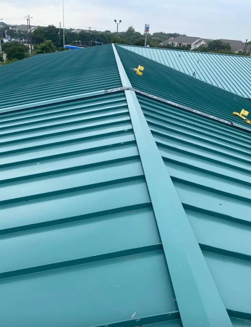 Green commercial metal roof ridge and valley for Metal Roof Repair in North Lynnwood